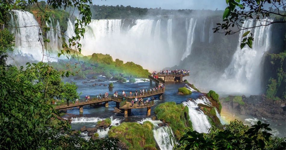 Iguazu Falls tours - Tourists exploring Iguazu Falls on the border of Brazil and Argentina