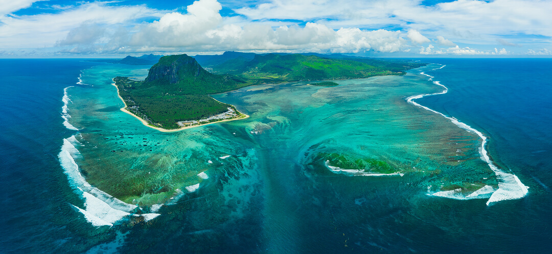 underwater waterfall mauritius aerial view le morne brabant ovago