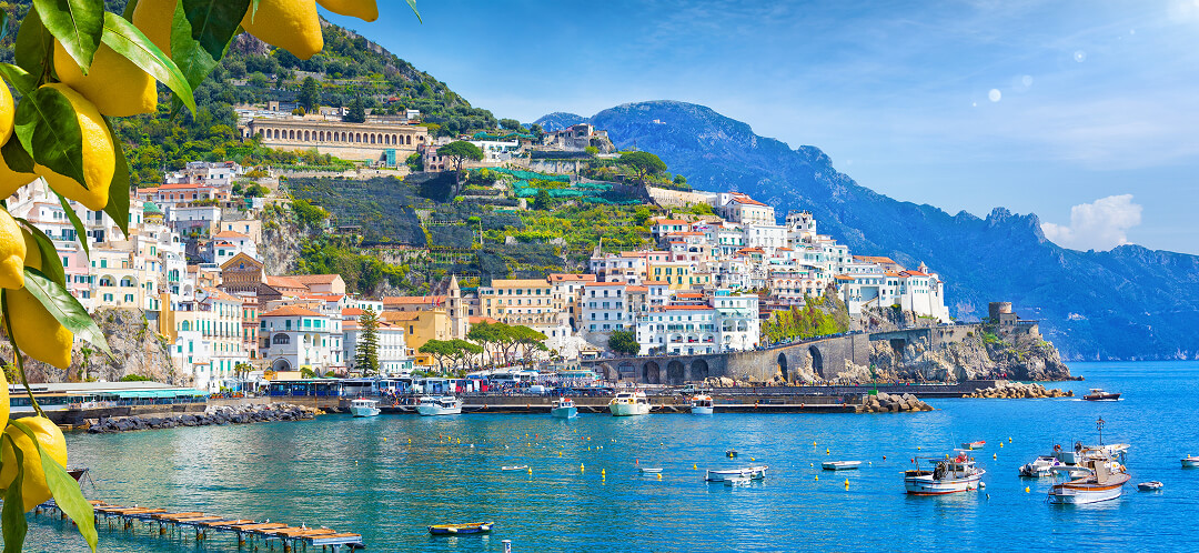 amalfi coast italy harbor boats lemons